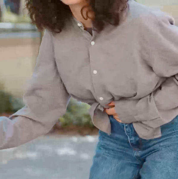 Woman holding stomach