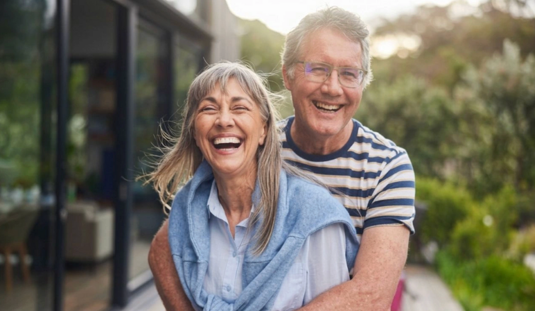 Couple smiling outdoors